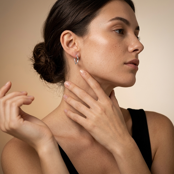 Model Wearing Dainty 925 sterling silver solid heart-shaped hoop earrings with snap bar back closures