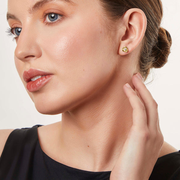 A pair of yellow gold rose flower stud earrings with a single zirconia centre stone-JOOLS by Jenny Brown