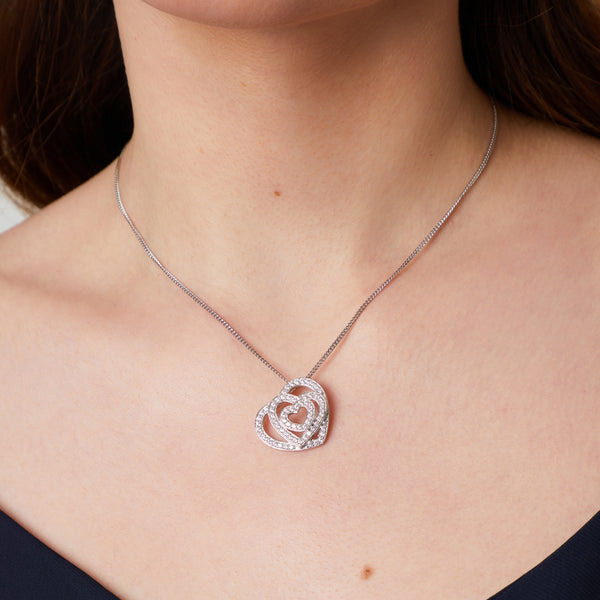 Sterling Silver pendant with three interlocking hearts, each studded with cubic zirconia stone-JOOLS by Jenny Brown