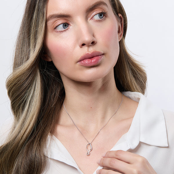 A sterling silver disc pendant set with cubic zirconia stones,-JOOLS by Jenny Brown