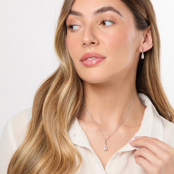 A pair of sterling silver drop earrings featuring radiant cut cubic zirconia stones,-JOOLS by Jenny Brown
