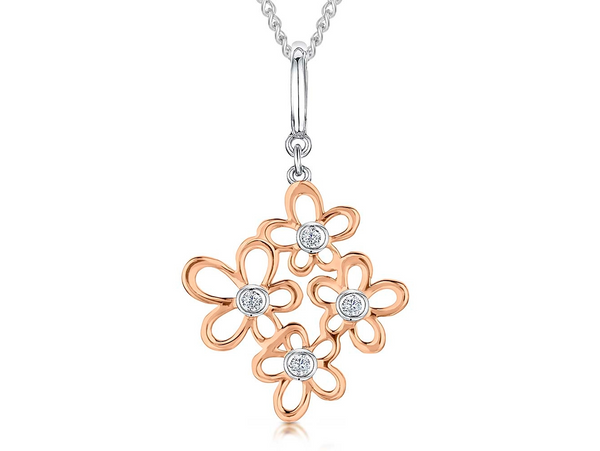 Rose gold multi-flower pendant set with cubic zirconia centres on a silver chain
