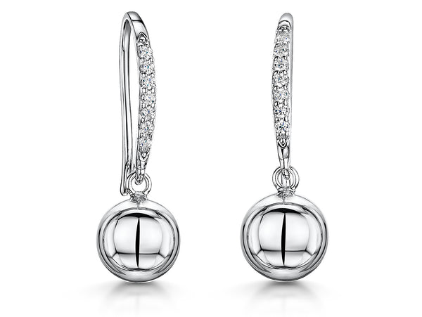 A pair of sterling silver fishhook earrings featuring a plain silver ball drop with pave set cubic zirconia stones