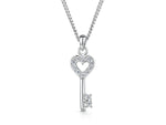 Load image into Gallery viewer, Sterling silver key-shaped pendant with a cubic zirconia heart, attached to a silver chain.-JOOLS by Jenny Brown