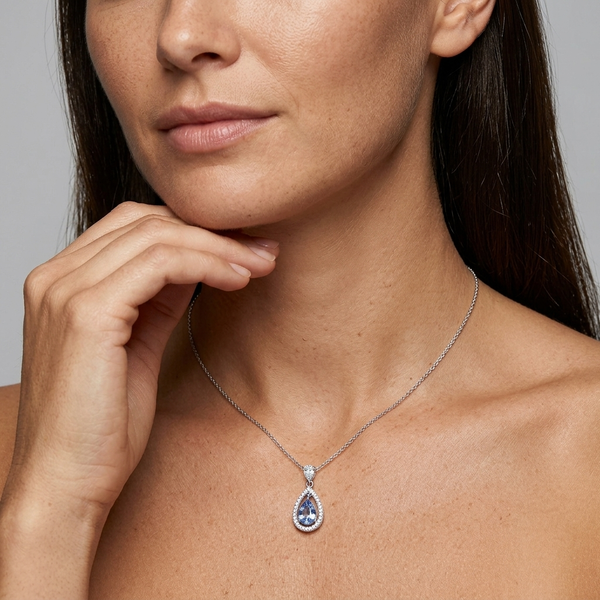 Sterling Silver Blue Topaz Zirconia Teardrop Pendant