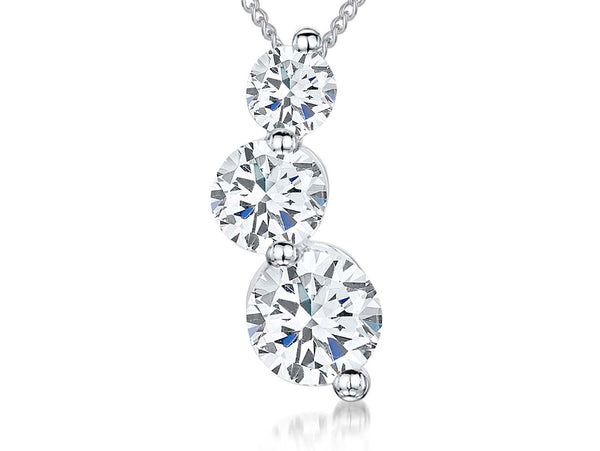 A sterling silver pendant with three cubic zirconia stones arranged in a curved drop design-JOOLS by Jenny Brown
