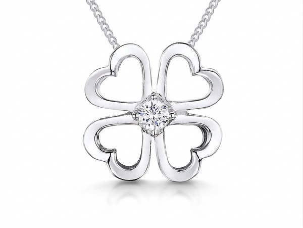 Sterling silver open four leaf clover pendant with a 3mm central cubic zirconia, attached to a silver chain-JOOLS by Jenny Brown