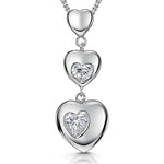 Load image into Gallery viewer, Sterling silver pendant featuring three bubbly hearts design with cubic zirconia embellishments.