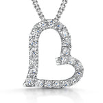 Load image into Gallery viewer, A sterling silver offset pave heart pendant with a cubic zirconia surround, set with small blue stones, on an adjustable chain-JOOLS by Jenny Brown