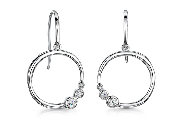 A pair of sterling silver circle earrings with offset rubover cubic zirconia -JOOLS by Jeny Brown