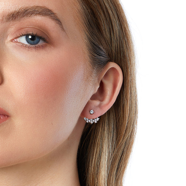 A pair of sterling silver jacket earrings with scattered cubic zirconia stones, designed to be worn under the lobe.-JOOLS by Jenny Brown