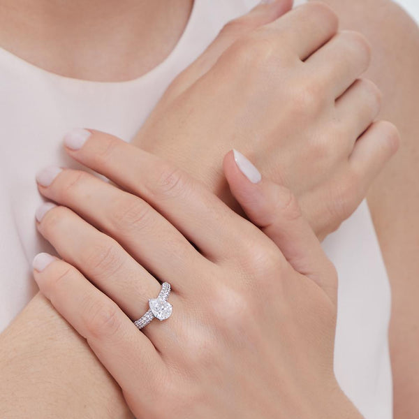 Sterling Silver Solitaire Ring Set With A Three Carat Pear Shape Centre Stone With Two Rows of Pave Set Stone Shoulders - JOOLS By Jenny Brown