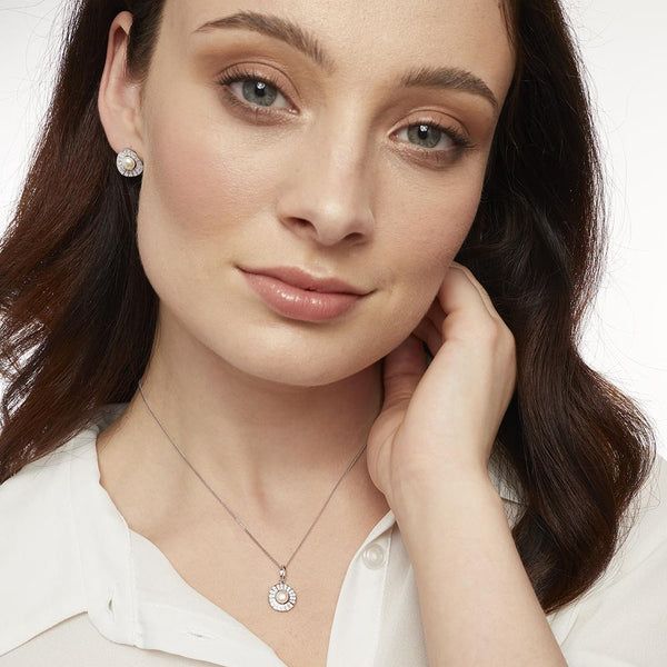 STERLING SILVER AND PEARL EARRINGS IN AN ART DECO STYLE BAGUETTE WHITE ZIRCONIA SURROUNDEarrings - JOOLS By Jenny Brown