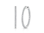 Load image into Gallery viewer, A pair of medium-sized sterling silver hoop earrings set with cubic zirconia's-JOOLS by Jenny Brown