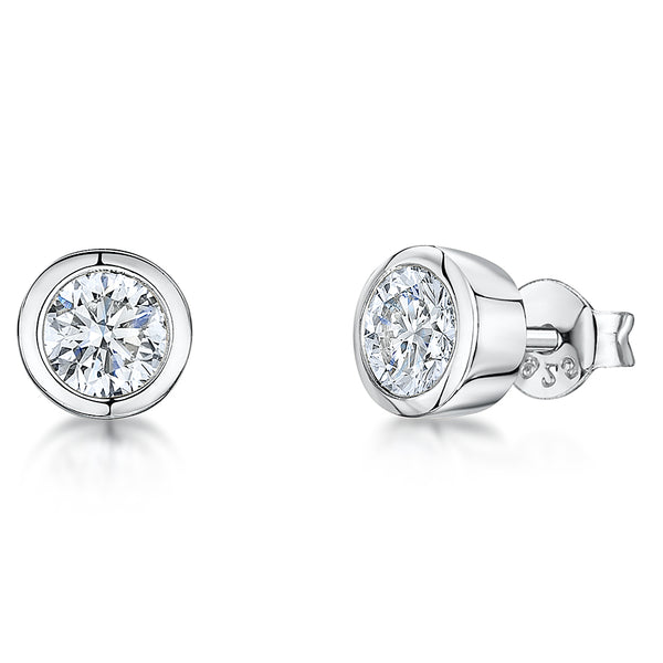 A pair of sterling silver stud earrings with a clear cubic zirconia inset in each stud.