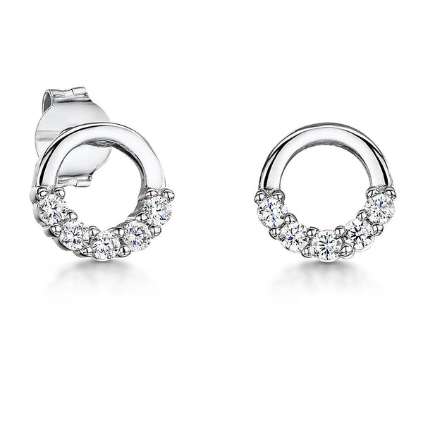 A pair of sterling silver circle earrings with white zirconia stones set in a half circle design.