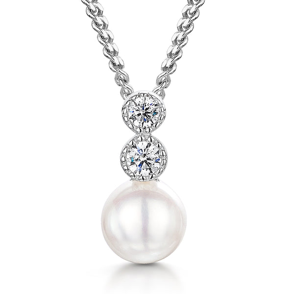A sterling silver necklace with a freshwater pearl pendant and two white zirconia stones set in a rhodium finished chain.