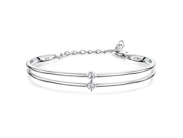 A sterling silver bangle bracelet with a two-row solid pattern set with cubic zirconia stones-JOOLS by Jenny Brown