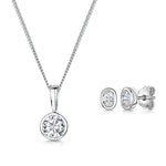 Load image into Gallery viewer, A set of sterling silver jewelry including an oval pendant necklace and round earrings, both adorned with cubic zirconia stones-JOOLS by Jenny Brown
