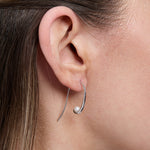 Load image into Gallery viewer, A pair of sterling silver pull through earrings with freshwater pearls, rhodium finished,-JOOLS by Jenny Brown
