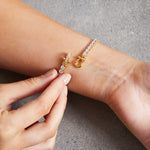 Load image into Gallery viewer, Yellow Gold Cubic Zirconia Tennis Bracelet Set With Buckle Clasp-JOOLS by Jenny Brown
