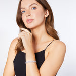 Load image into Gallery viewer, Sterling Silver Triple Row 30 ct Cubic Zirconia Tennis Bracelet-JOOLS by Jenny Brown
