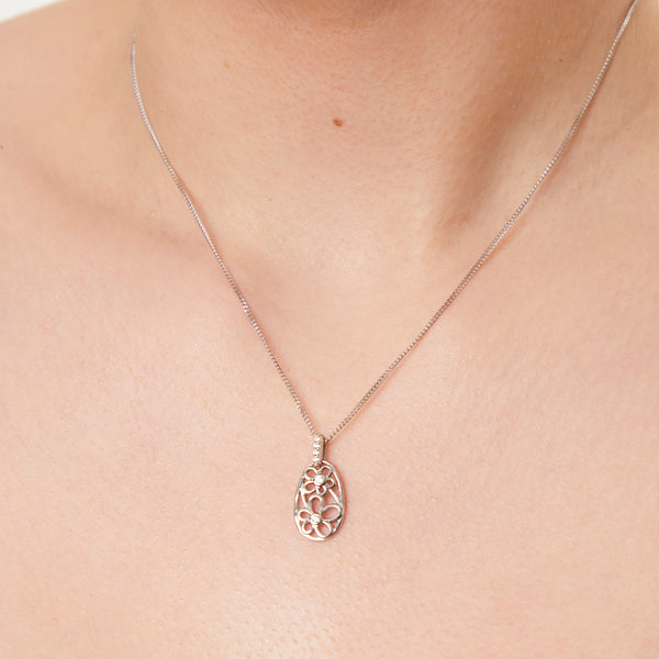 Sterling Silver Oval Pendant Filled With Flowers