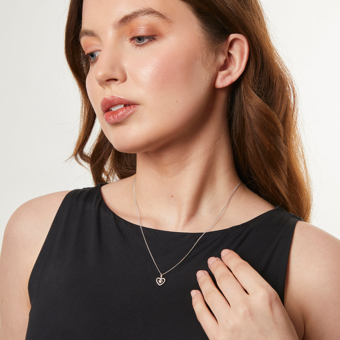 Sterling Silver Heart With A Woven Surround