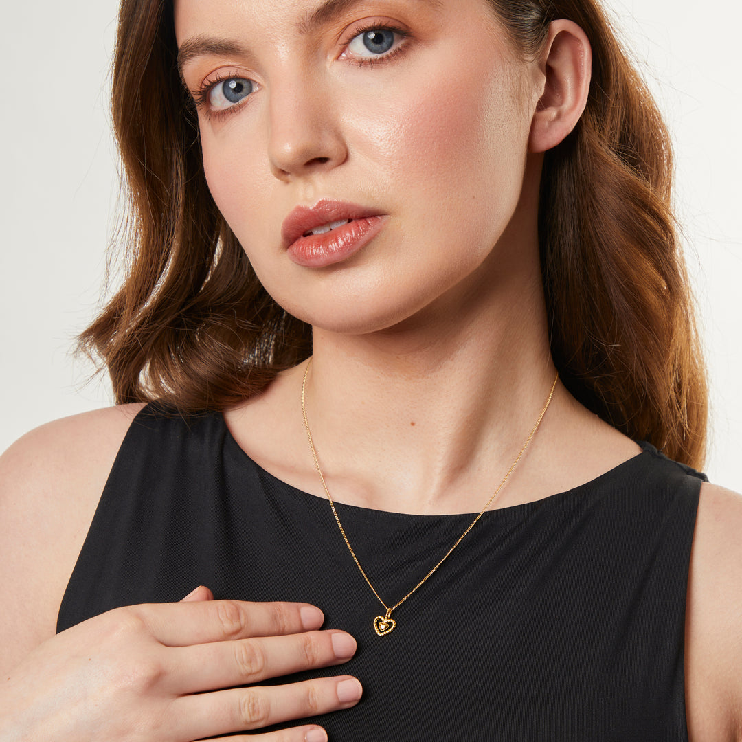 Heart Pendant With A Woven Surround