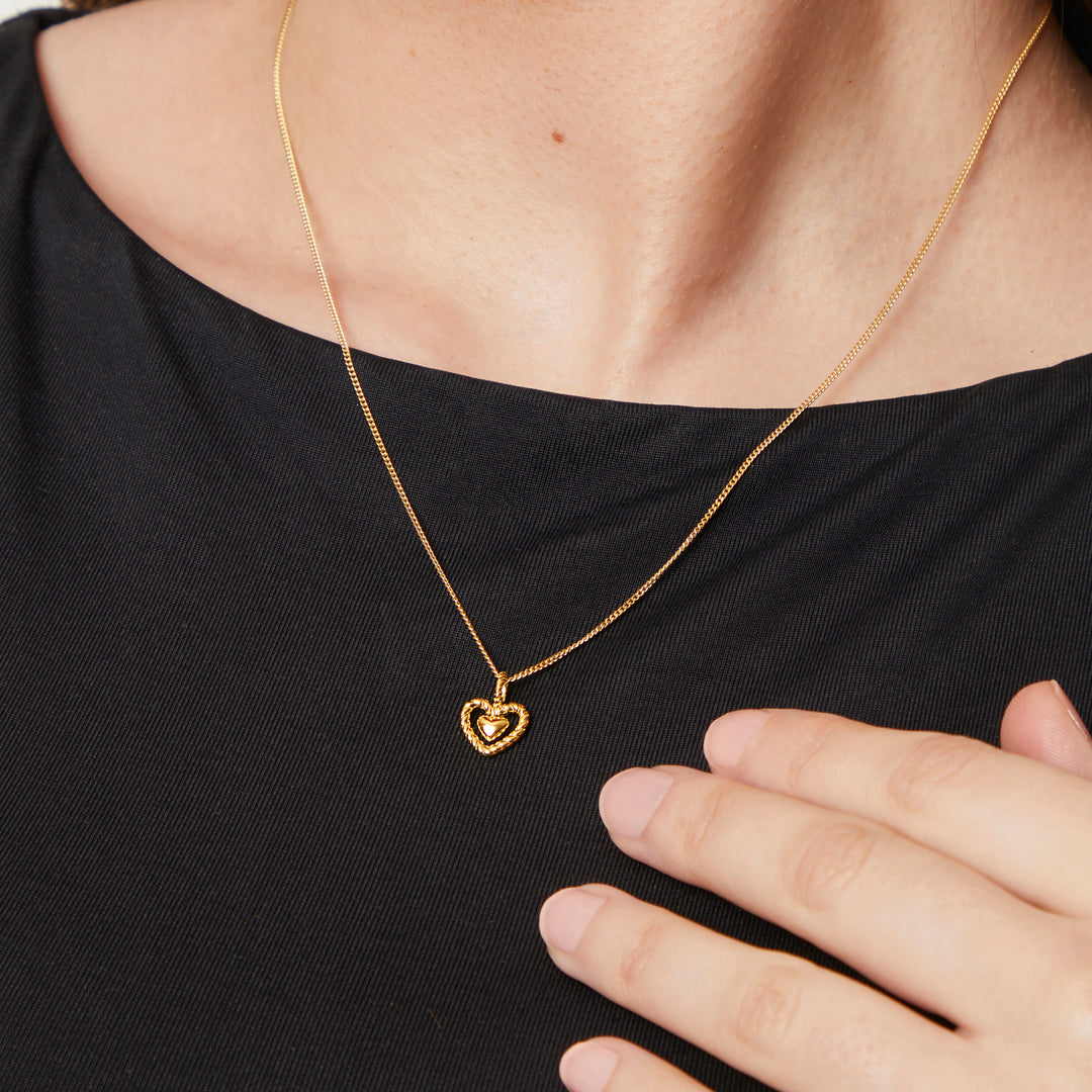 Heart Pendant With A Woven Surround