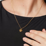 Load image into Gallery viewer, Heart Pendant With A Woven Surround
