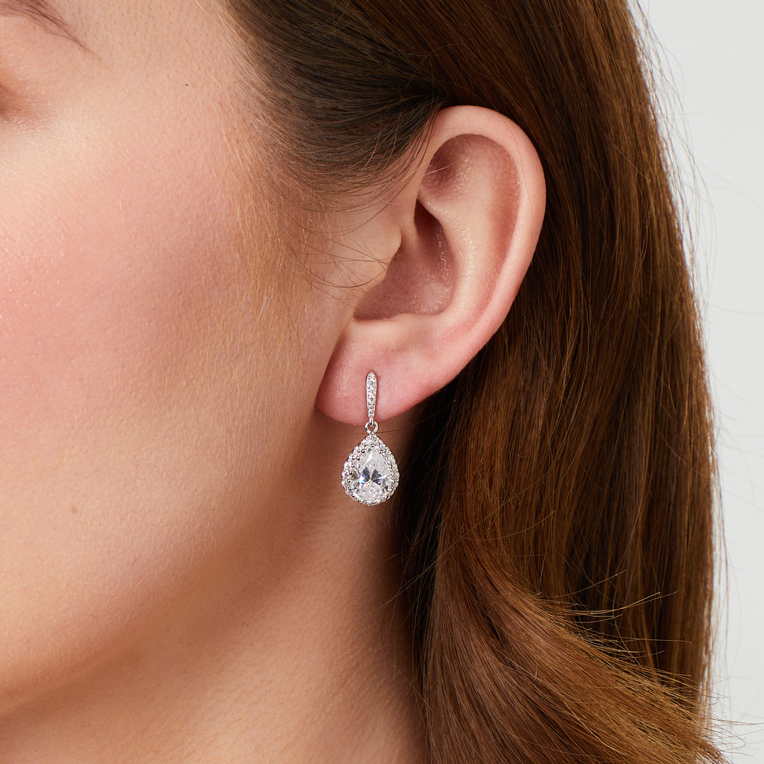 A pair of sterling silver pear drop halo earrings with cubic zirconia centers-JOOLS by Jenny Brown