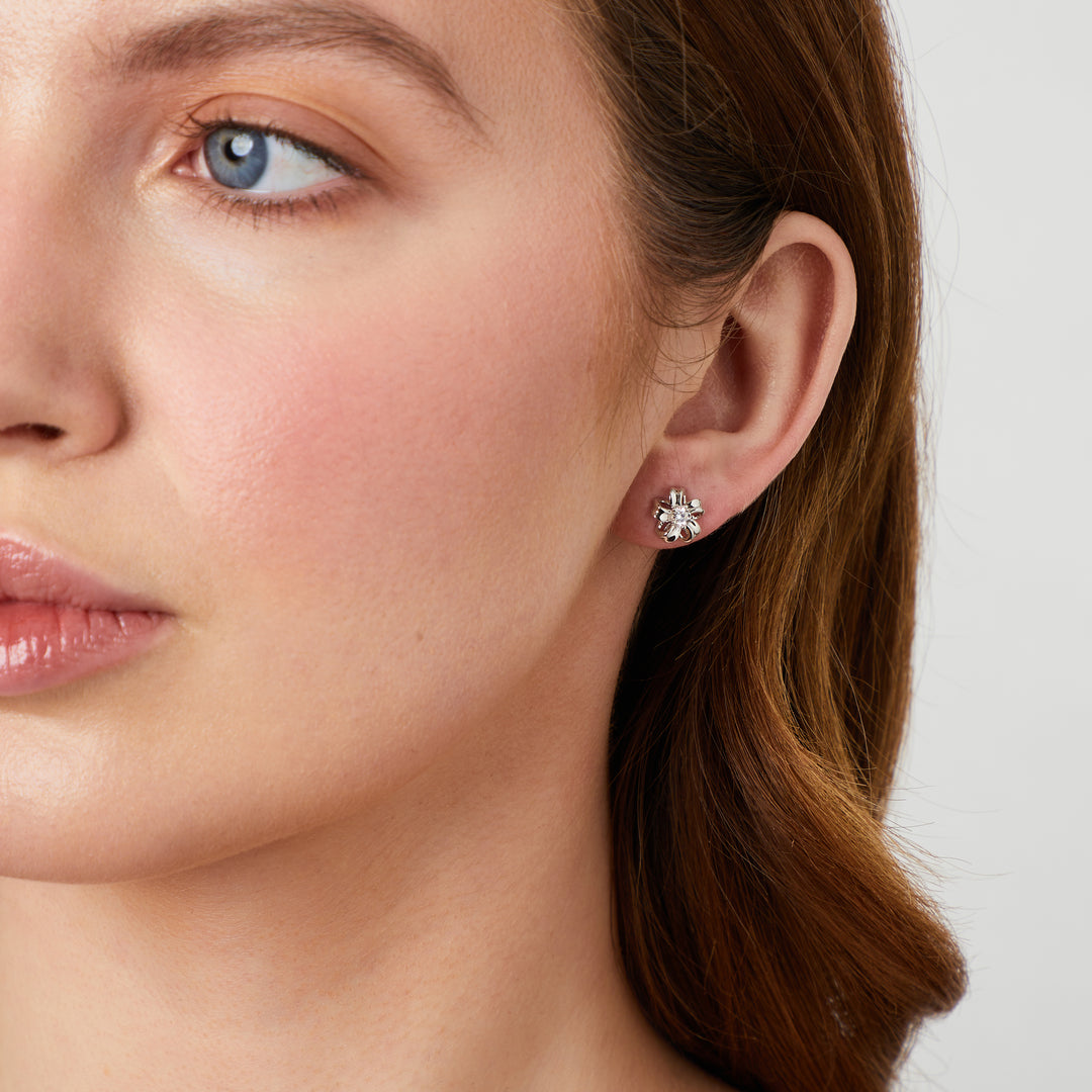 Sterling Silver Delicate Flower Stud With Folded Petals And Central Cubic Zirconia JOOLS by Jenny Brown