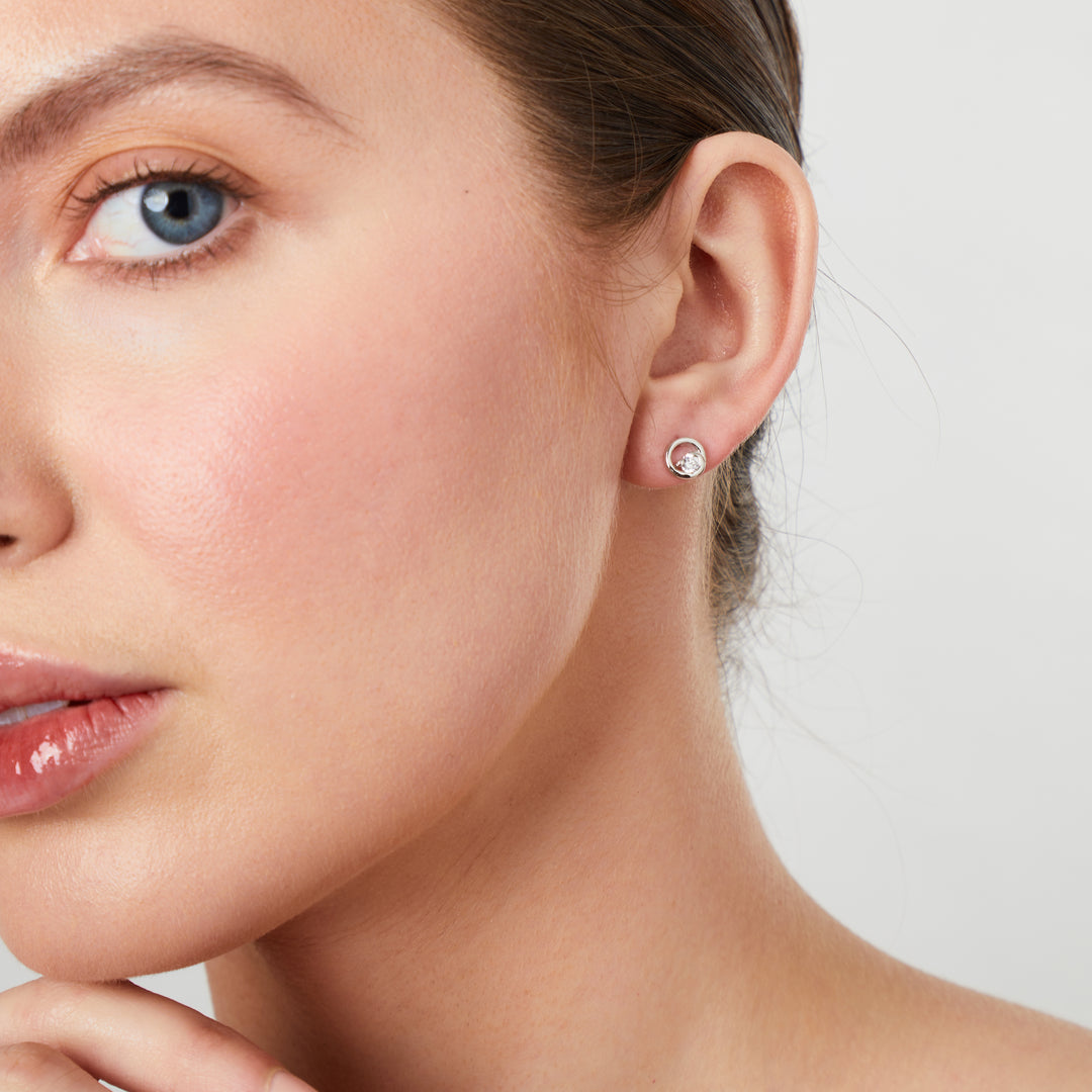 Sterling Silver Open Swirl Circle Stud Set With Offset Cubic Zirconia JOOLS by Jenny Brown