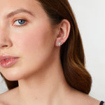 Load image into Gallery viewer, A pair of sterling silver snowflake earrings with a central cubic zirconia stone in each earring-JOOLS by Jenny Brown
