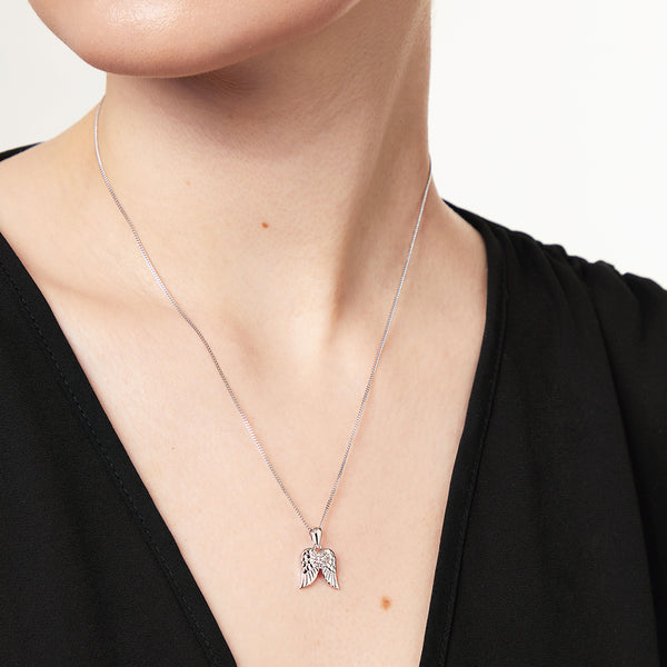 Sterling Silver Wing Pendant Set With A Cubic Zirconia Heart CentrePendants - JOOLS By Jenny Brown