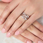 Load image into Gallery viewer, Sterling Silver Ring With Four Open Twisted  Bands Half  Set With Cubic Zirconia Stones- JOOLS By Jenny 
