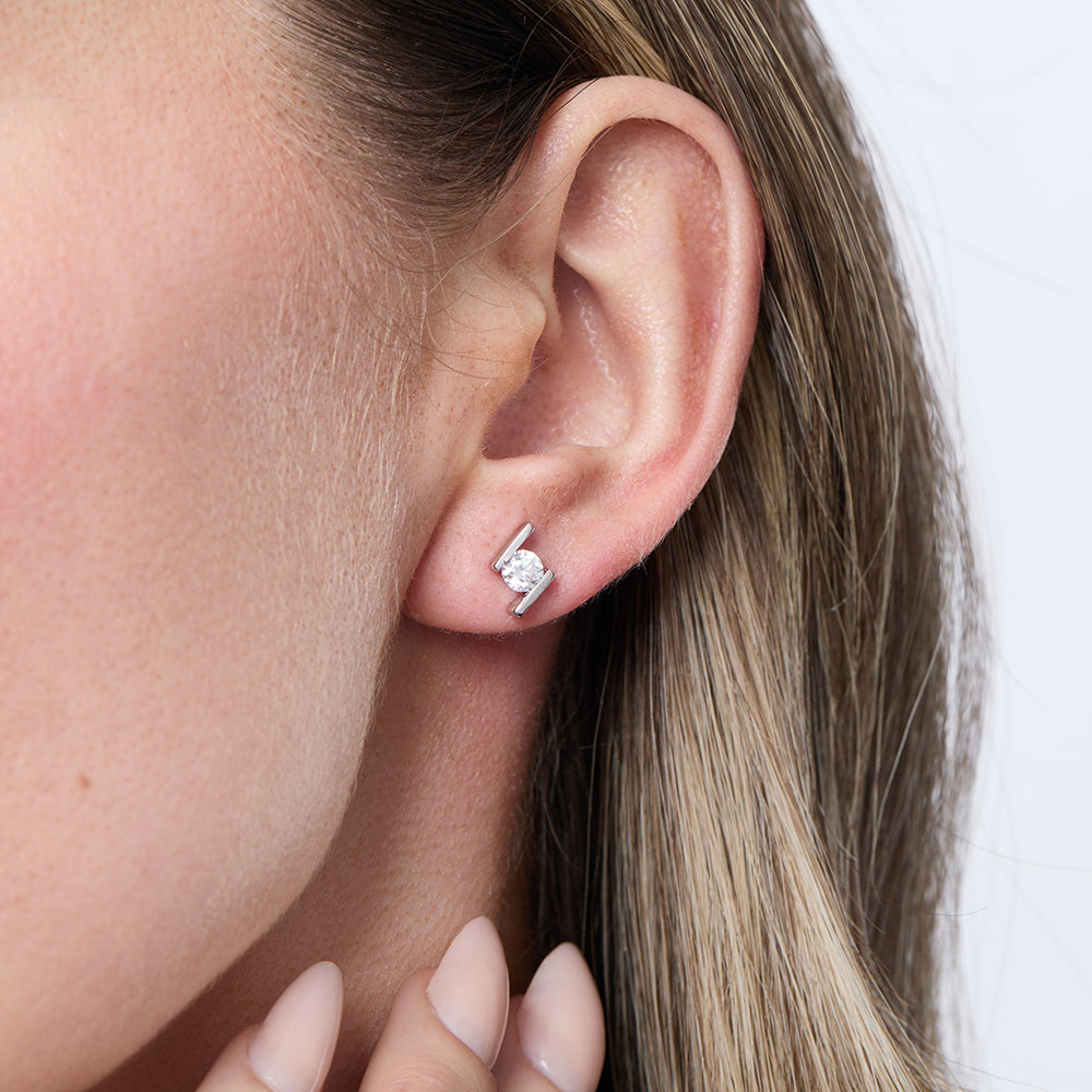 Sterling Silver Swirl Stud Earrings Set With Round Brilliant Cut Cubic Zirconia StonesEarrings - JOOLS By Jenny Brown