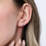Load image into Gallery viewer, Sterling Silver Swirl Stud Earrings Set With Round Brilliant Cut Cubic Zirconia StonesEarrings - JOOLS By Jenny Brown
