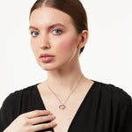 Load image into Gallery viewer, Sterling silver three circle pendant with cubic zirconia stones set in the inner circles, attached to a silver chain-JOOLS by Jenny Brown
