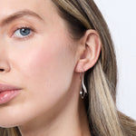 Load image into Gallery viewer, model wearing wearing Sterling Silver Leaf Drop Earrings - JOOLS By Jenny Browne.
