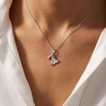 Load image into Gallery viewer, Sterling Silver Twisted Petal Pendant With Cubic Zirconias
