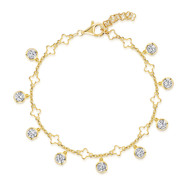 A yellow gold clover charm bracelet with  nine cubic zirconia stones -JOOLS by Jenny Brown