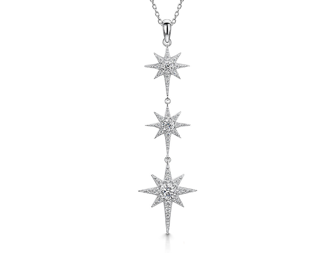 Sterling silver necklace with three star drop designs, set with cubic zirconia stones, on an adjustable chain.- JOOLS by Jenny Brown