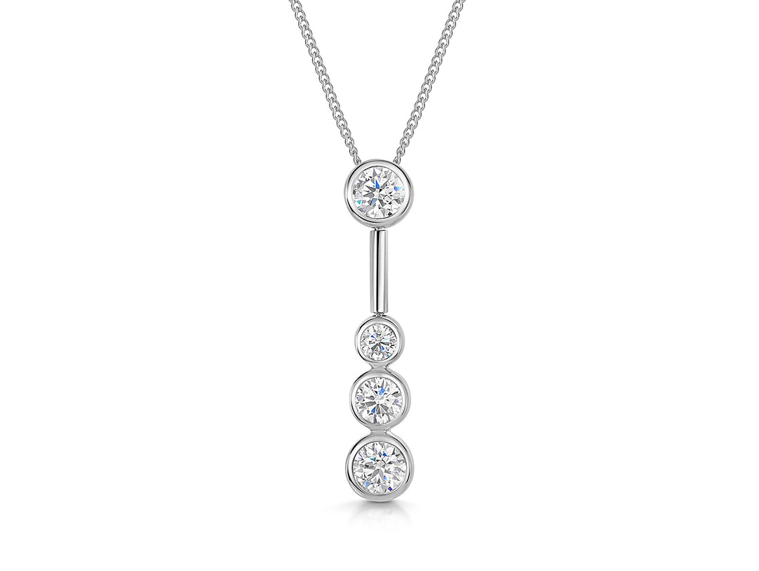 A sterling silver drop bubble pendant with four set cubic zirconia stones, suspended from a chain-JOOLS by Jenny Brown