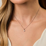 Load image into Gallery viewer, A sterling silver solitaire pendant with a round cubic zirconia stone on a silver chain-JOOLS by Jenny Brown
