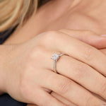 Load image into Gallery viewer, A sterling silver square solitaire ring with a princess cut 1 Carat cubic 

