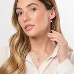 Load image into Gallery viewer, A pair of sterling silver half hoop earrings with halo cubic zirconia drop,-JOOLS by Jenny Brown
