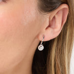 Load image into Gallery viewer, A pair of sterling silver half hoop earrings with halo cubic zirconia drop,-JOOLS by Jenny Brown
