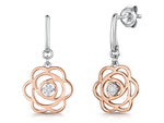 Load image into Gallery viewer, A pair of rose gold drop earrings featuring a rose petal design with a central cubic zirconia stone, accompanied by sterling silver details.
